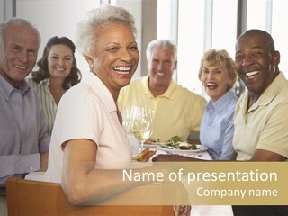 A Group Of People Sitting At A Table With Wine Glasses PowerPoint Template