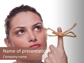 Attractive Young Woman Trying To Remember What The Piece Of String Round Her Finger Was Meant To Remind Her Of, Isolated On White Background. PowerPoint Template