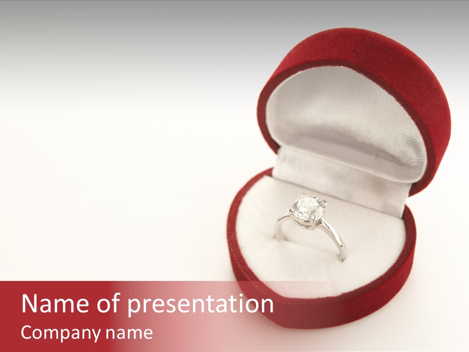 An Open Red Velvet Ring Box With A White Diamond In It PowerPoint Template