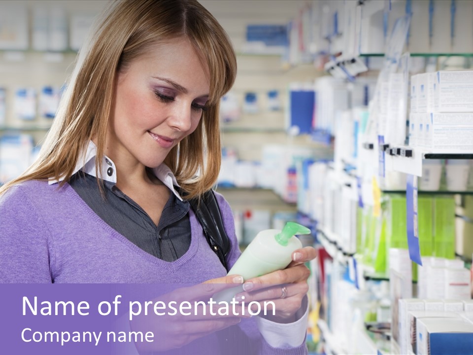 Portrait Of Blonde Woman Reading Label Of Shampoo In Pharmacy. Copy Space PowerPoint Template