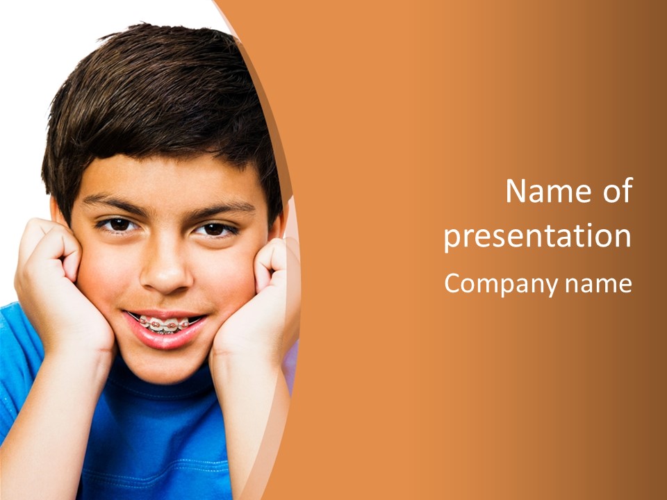Portrait Of A Boy Smiling Isolated Over White PowerPoint Template