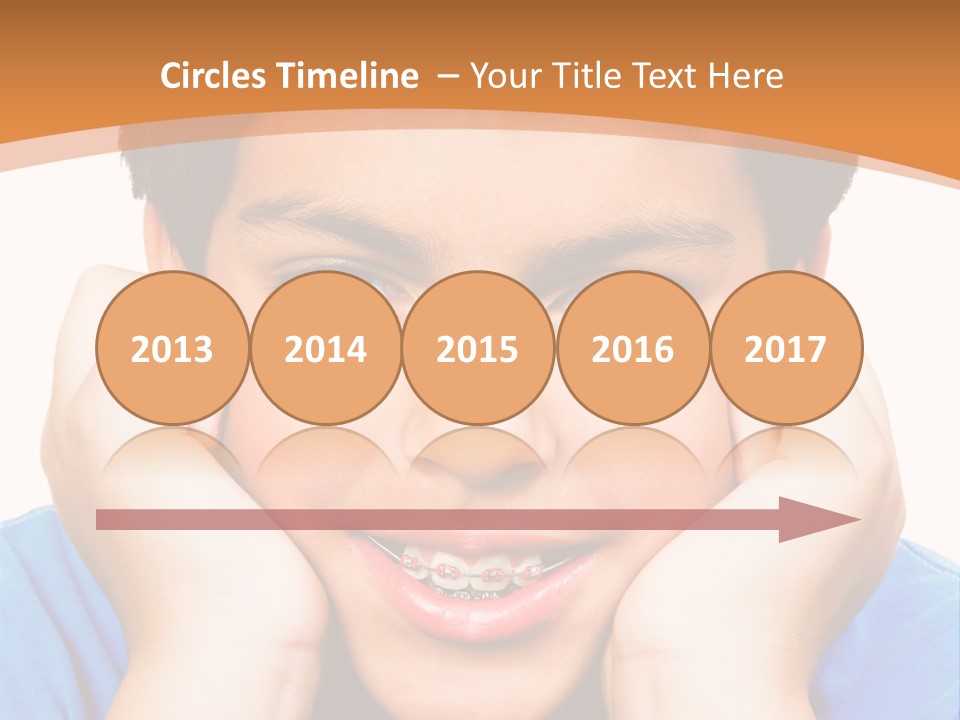 Portrait Of A Boy Smiling Isolated Over White PowerPoint Template