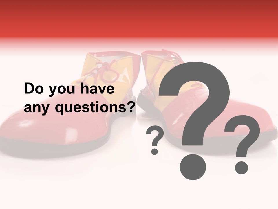 A Pair Of Huge Colorful Clown Shoes On A White Background With Copy Space PowerPoint Template