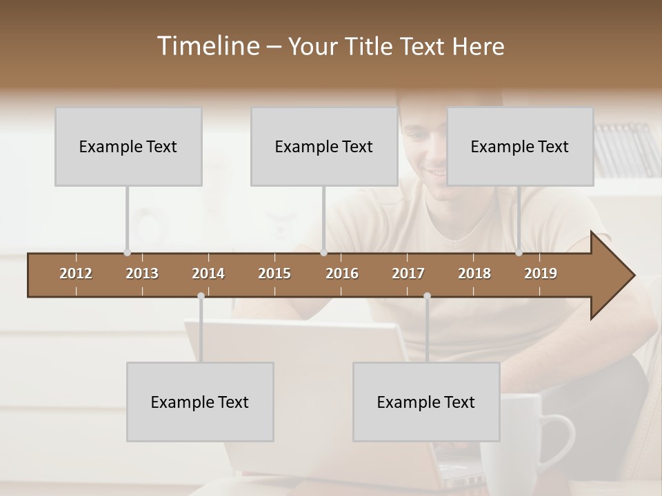 Happy Young Man In T-Shirt Sitting On Sofa At Home, Working On Laptop Computer, Smiling. PowerPoint Template