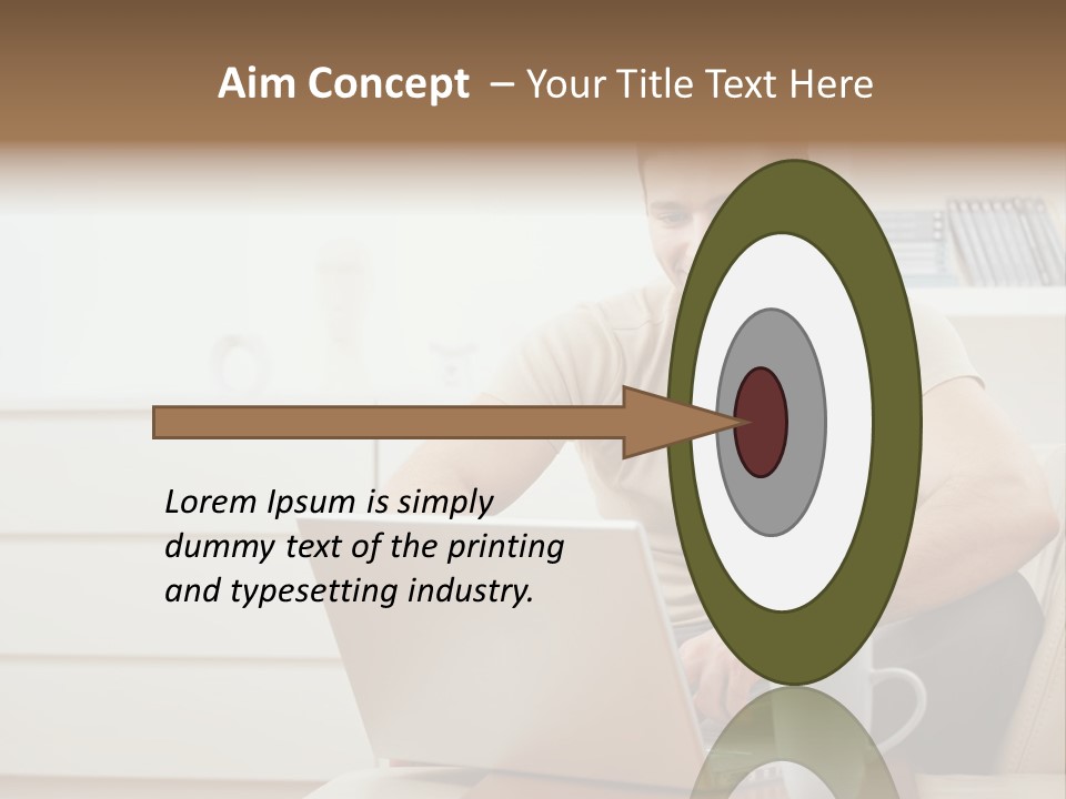 Happy Young Man In T-Shirt Sitting On Sofa At Home, Working On Laptop Computer, Smiling. PowerPoint Template