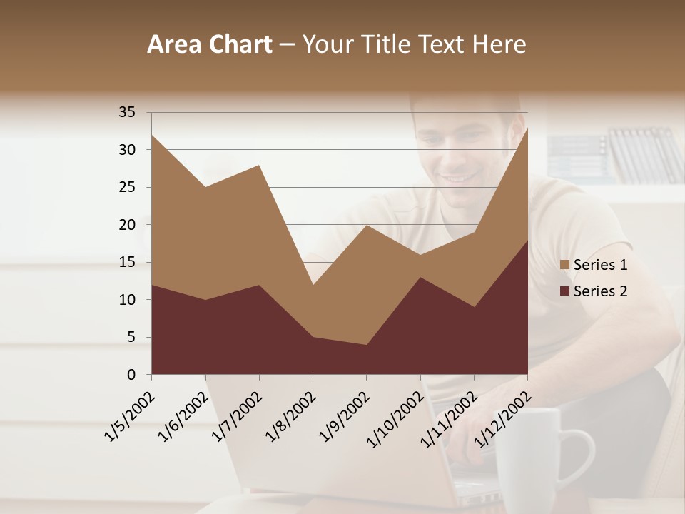 Happy Young Man In T-Shirt Sitting On Sofa At Home, Working On Laptop Computer, Smiling. PowerPoint Template
