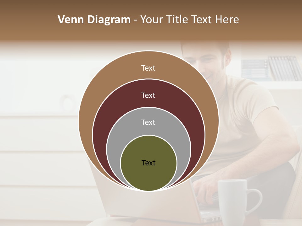 Happy Young Man In T-Shirt Sitting On Sofa At Home, Working On Laptop Computer, Smiling. PowerPoint Template