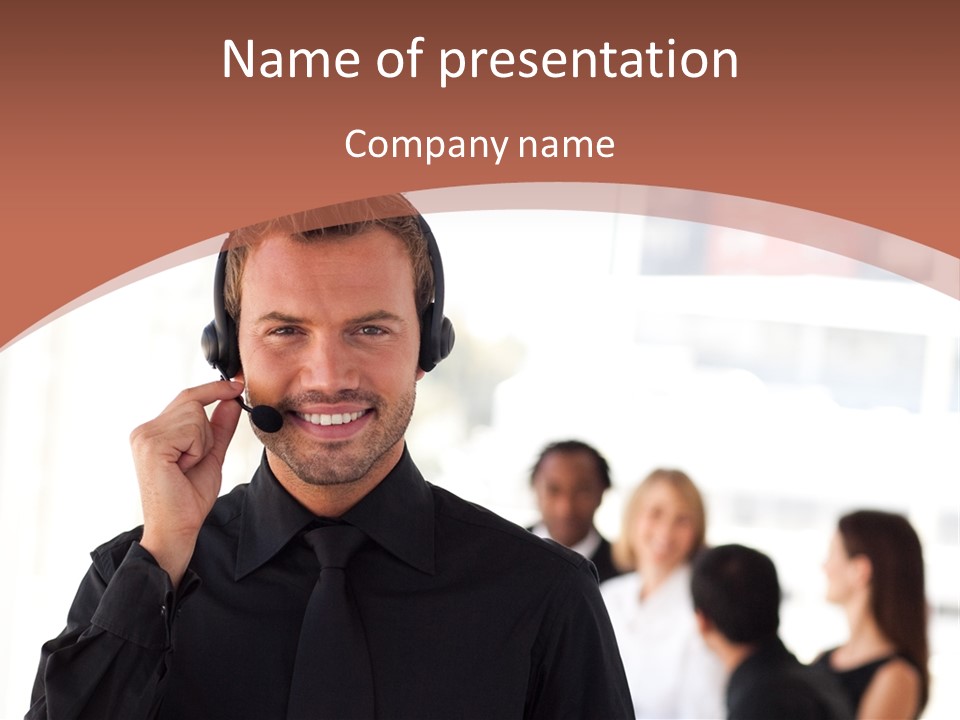 A Man Wearing A Headset With A Group Of People In The Background PowerPoint Template