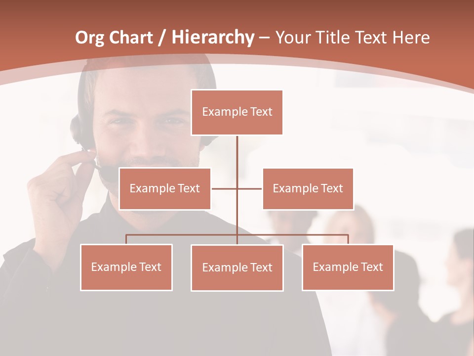 A Man Wearing A Headset With A Group Of People In The Background PowerPoint Template