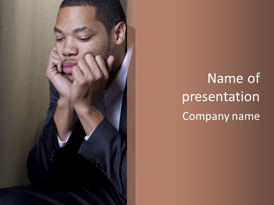 A Sad Businessman Rests His Hands On His Chin PowerPoint Template