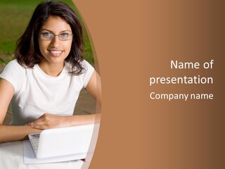 Cheerful Young Indian College Student Outdoors With Laptop PowerPoint Template