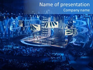 A Large Crowd Of People In Front Of A Stage PowerPoint Template