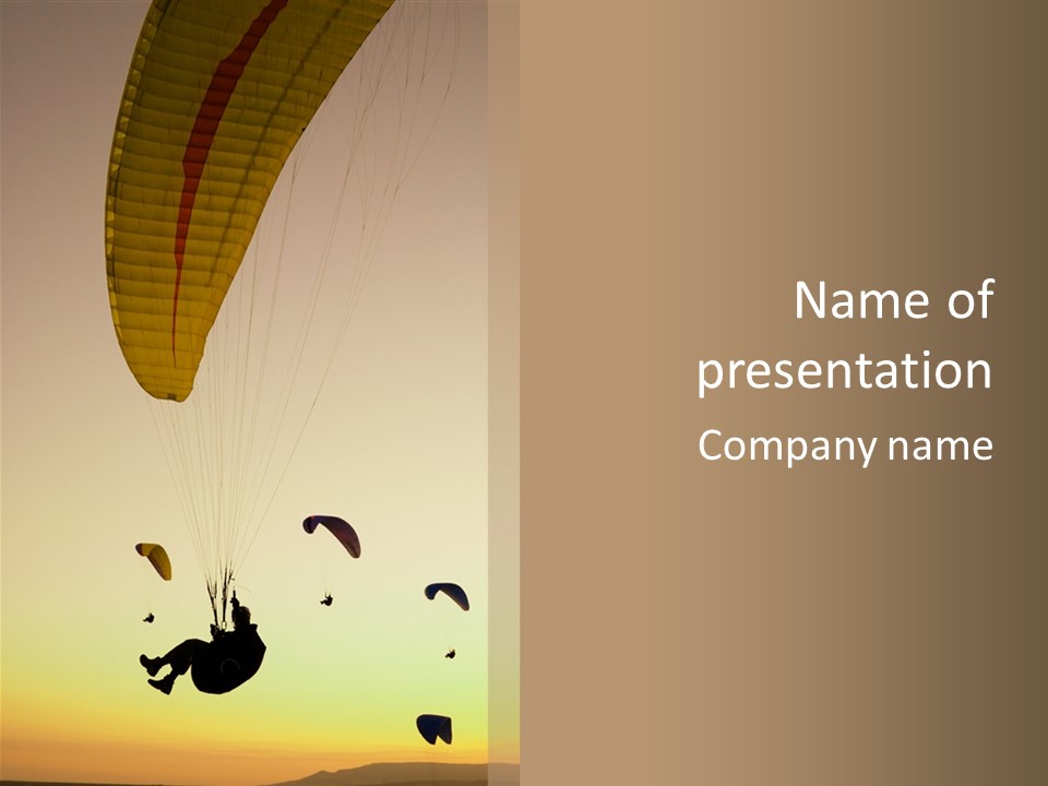 Paraglider In The Dusk Sky PowerPoint Template