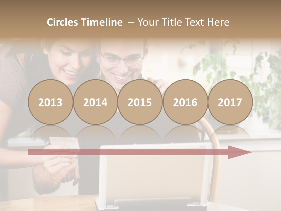 A Happy Couple Holding A Credit Card Shopping Online PowerPoint Template