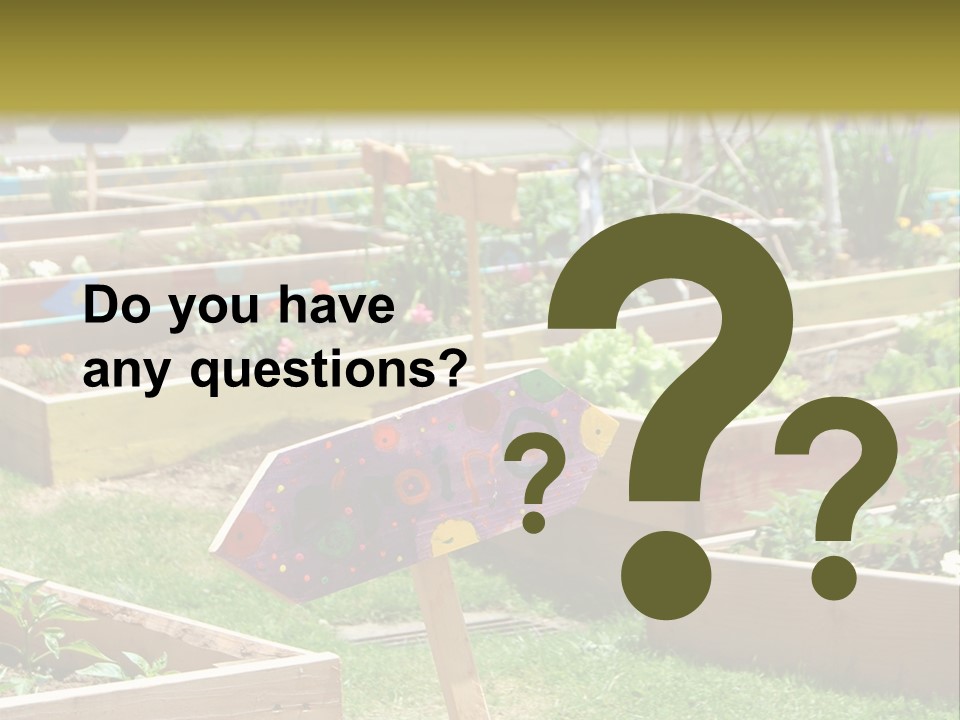 A Picture Of A Garden With A Sign In The Middle Of It PowerPoint Template