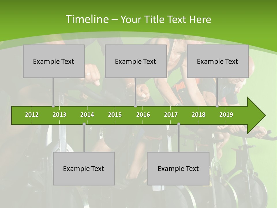 A Group Of People Riding Stationary Bikes In A Gym PowerPoint Template