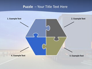 A Semi Truck Driving Down A Highway At Sunset PowerPoint Template