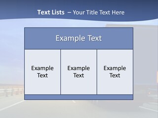 A Semi Truck Driving Down A Highway At Sunset PowerPoint Template