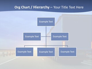 A Semi Truck Driving Down A Highway At Sunset PowerPoint Template