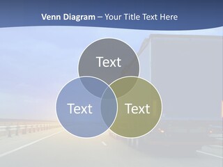 A Semi Truck Driving Down A Highway At Sunset PowerPoint Template