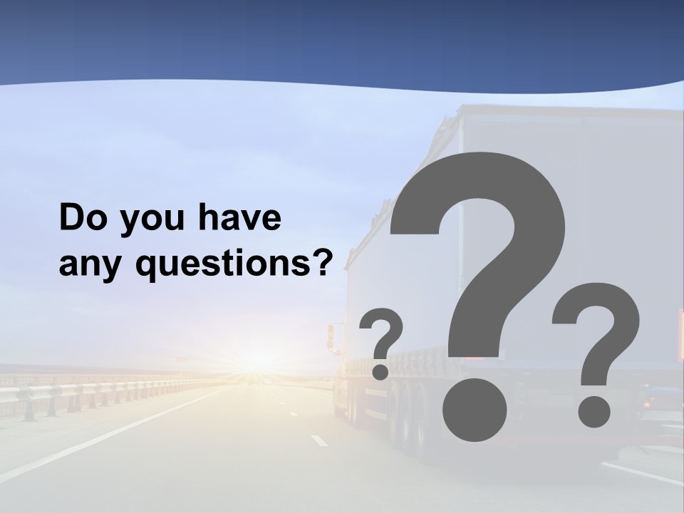 A Semi Truck Driving Down A Highway At Sunset PowerPoint Template