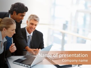 A Group Of Business People Looking At A Laptop PowerPoint Template