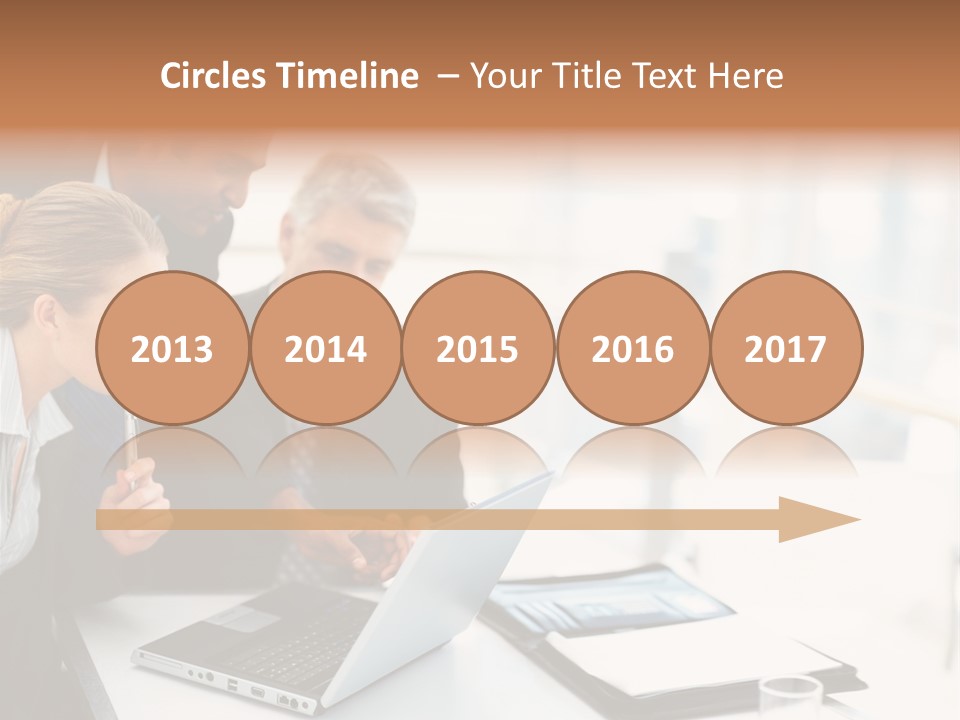 A Group Of Business People Looking At A Laptop PowerPoint Template