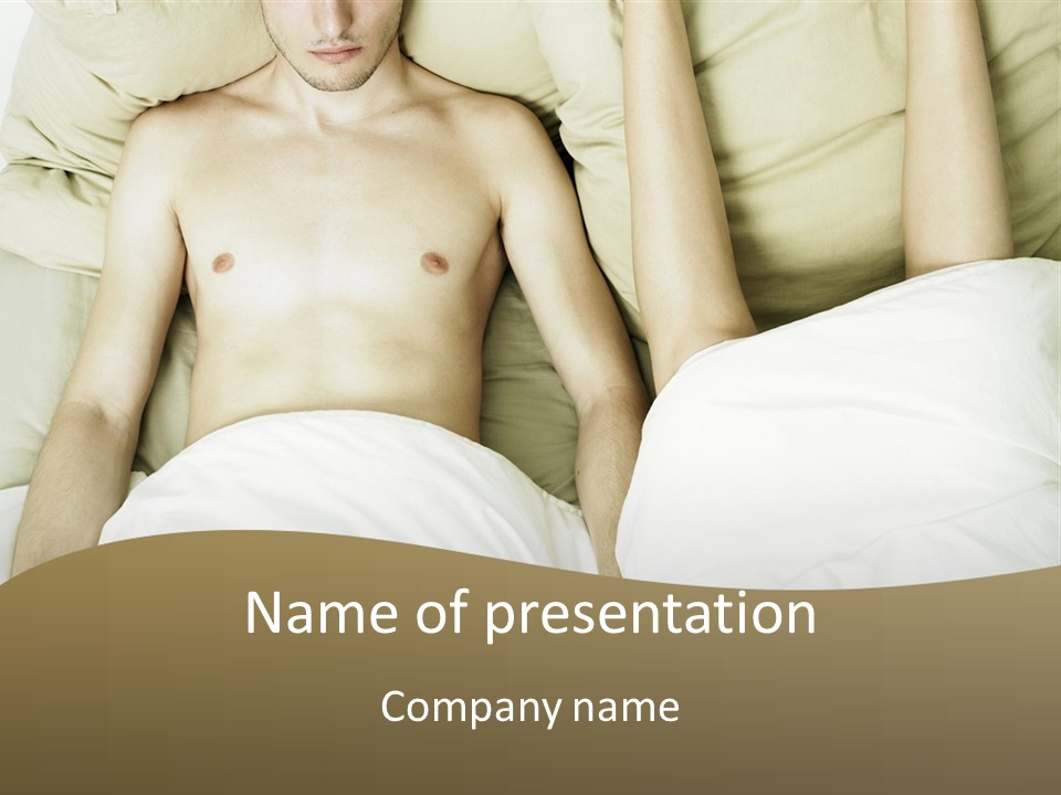 Fashion Portrait Of Beautiful Young Lovers In Bed PowerPoint Template