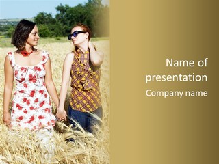 Two Young Girls In Wheat Field Holding Hands PowerPoint Template