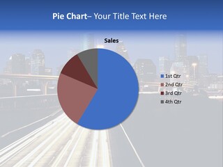 Lighted Houston Skyline Against Blue Sky PowerPoint Template