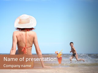 Young Mother With Son On The Beach PowerPoint Template