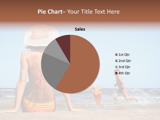 Young Mother With Son On The Beach PowerPoint Template