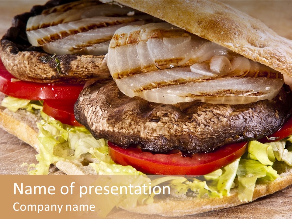 Portobello Sandwich With Grilled Onion Lettuce And Tomato PowerPoint Template
