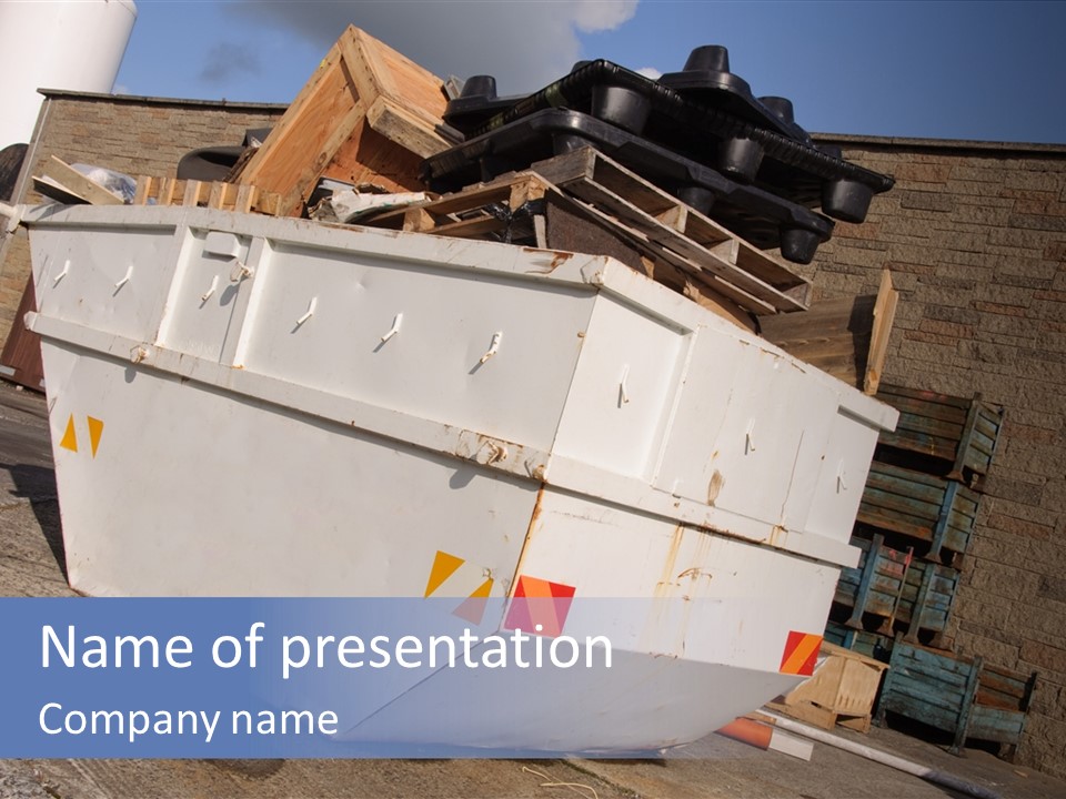 A Large White Boat Sitting In Front Of A Building PowerPoint Template