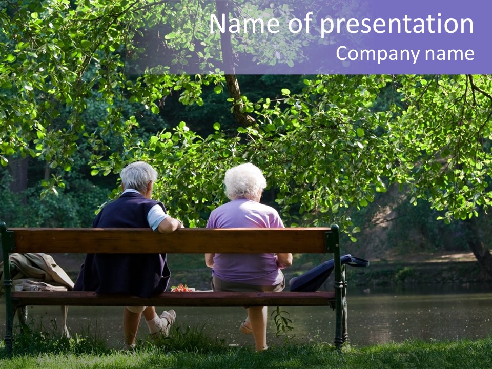 Aged Couple Enjoy Spring Morning On The Bench Near Lake In The Park PowerPoint Template