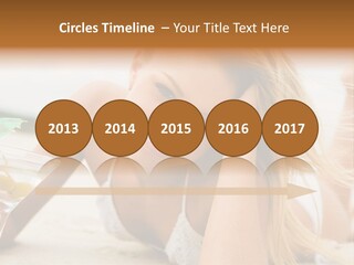 Image Of Pretty Girl With Martini Glass Lying On Sandy Beach And Looking At Camera PowerPoint Template