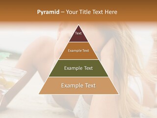 Image Of Pretty Girl With Martini Glass Lying On Sandy Beach And Looking At Camera PowerPoint Template