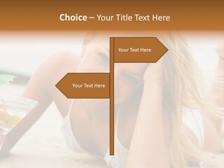 Image Of Pretty Girl With Martini Glass Lying On Sandy Beach And Looking At Camera PowerPoint Template