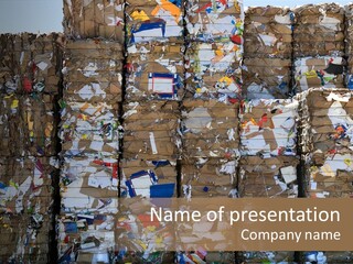 A Big Stack Of Paper Bales For Recycling PowerPoint Template