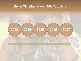 Brother And Sister Playing Outside PowerPoint Template