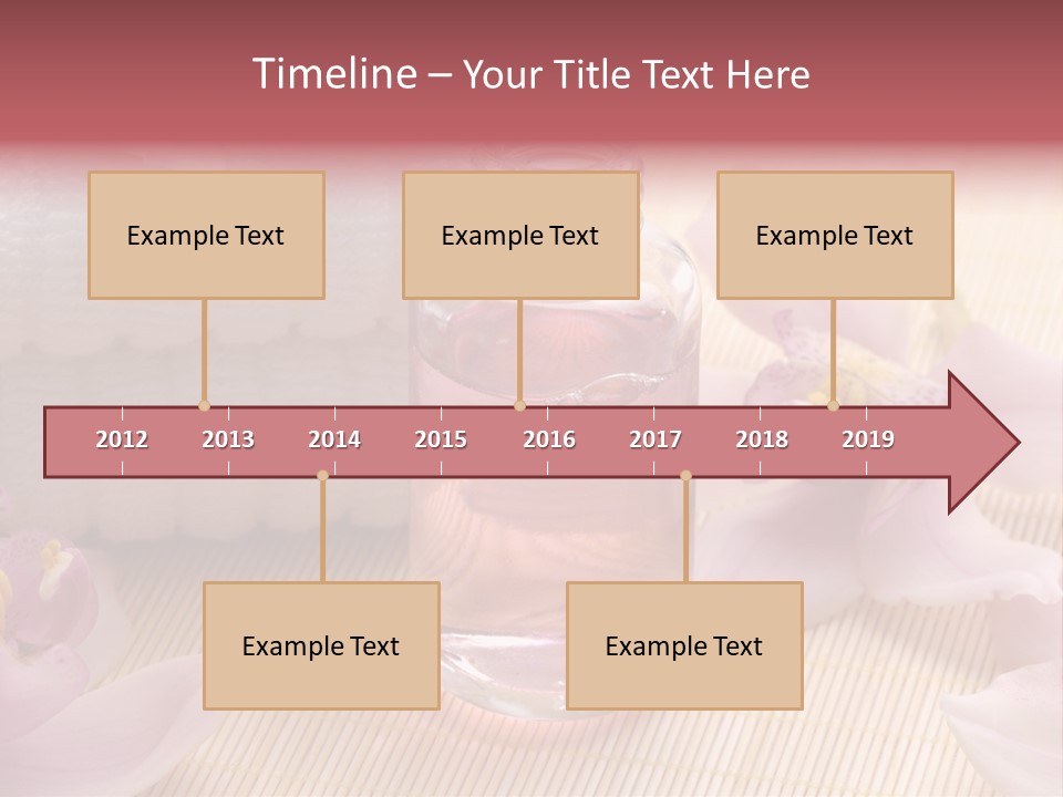 A Bottle Of Perfume Next To A Towel And Flowers PowerPoint Template