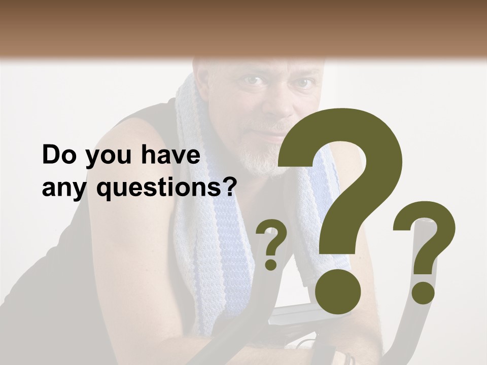 Man Excercising At Home On Bicycle PowerPoint Template