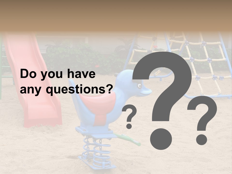 A Playground With A Slide And A Slide In The Sand PowerPoint Template