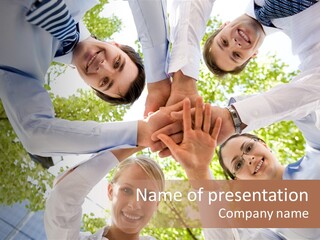 Bottom View Of People Making Pile Of Hands On Background Of Green Foliage PowerPoint Template