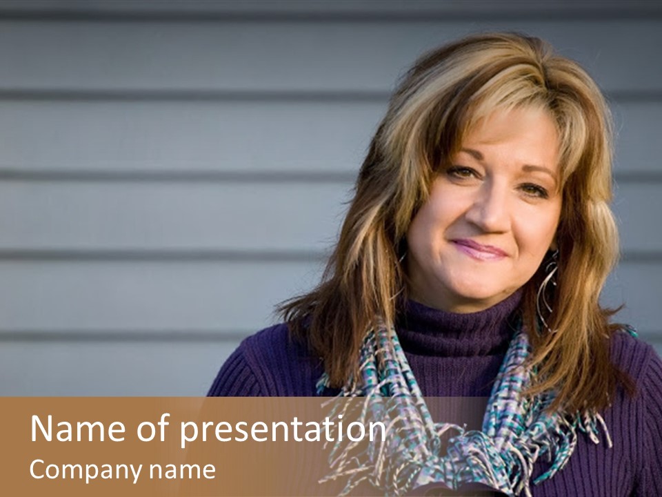 A Pretty Middle Aged Woman With A Very Sincere Smile. PowerPoint Template