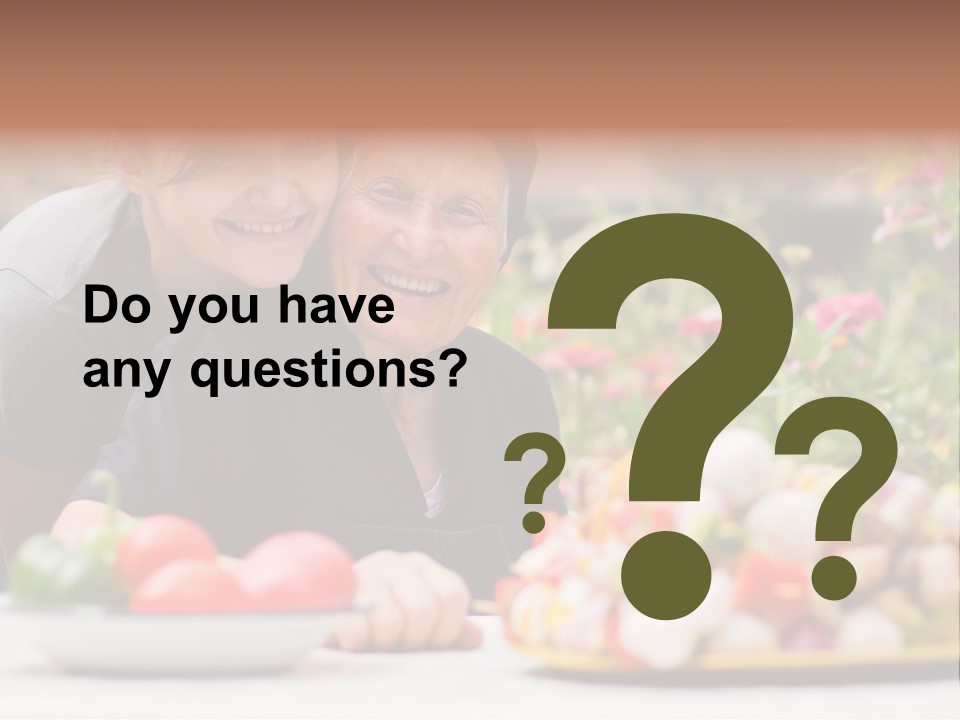 A Young Woman - Grandchild Or Carer - Next To An Old Woman At The Table, With Fresh Food In Front Of Them. PowerPoint Template