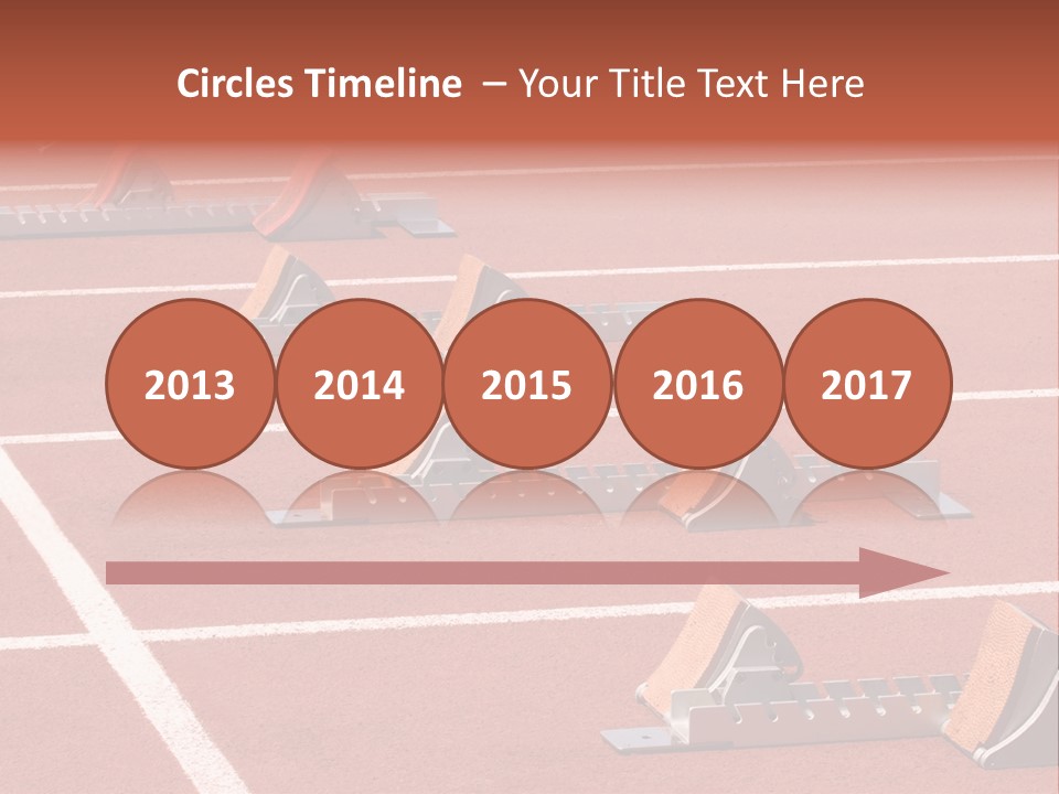 A Row Of Metal Ramps On A Red Tennis Court PowerPoint Template