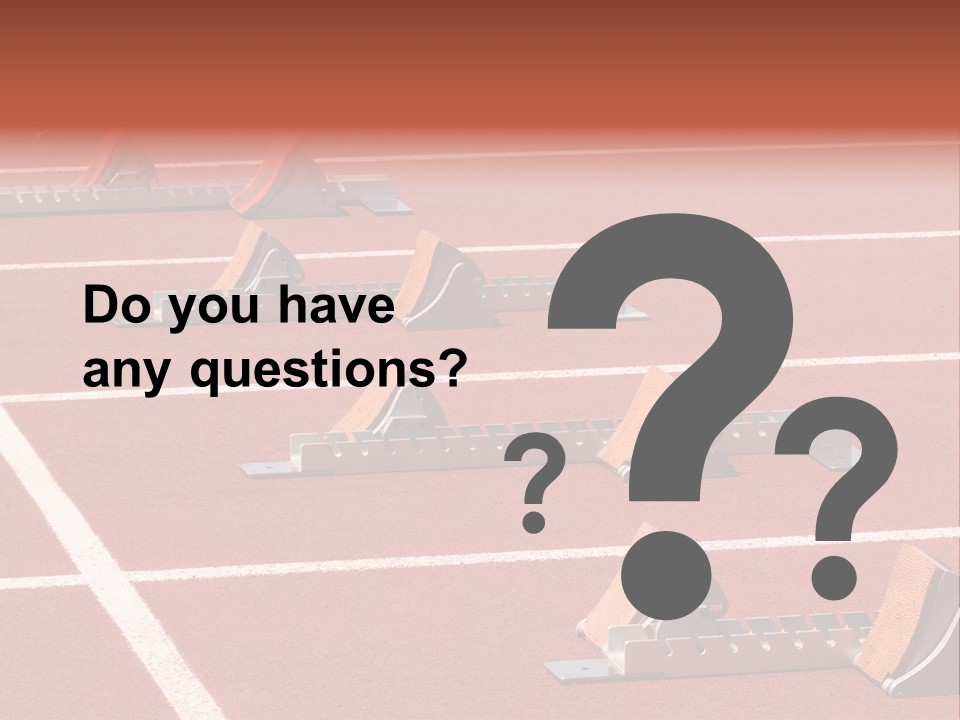 A Row Of Metal Ramps On A Red Tennis Court PowerPoint Template