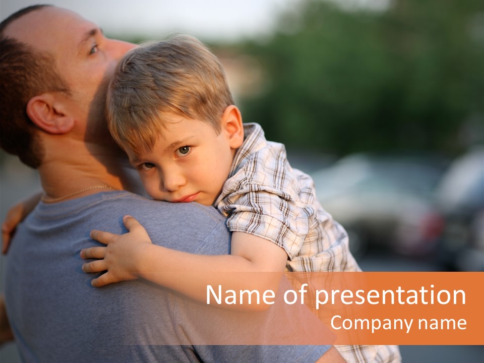 Little Boy Hugging Hugging Father Around Shoulders PowerPoint Template