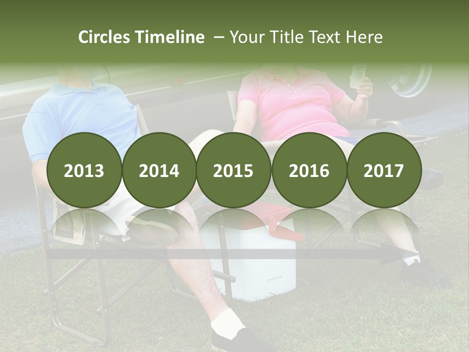 Senior Campers Sitting In Folding Chairs Outside Their Motor Home. PowerPoint Template